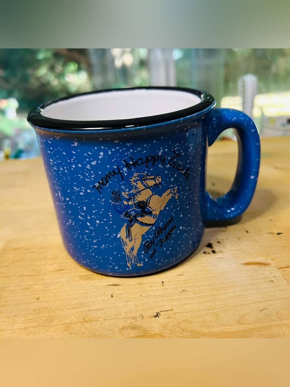 Blue enamel-style coffee mug features a "Roy Rogers and Trigger" Illustration